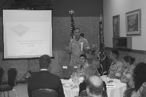 Lt. Col. Michael Schutte, USMC, assistant chief of staff/G-6, 3rd Marine Aircraft Wing, speaks to chapter members during the April meeting.